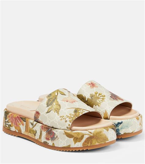 gucci slides blue flower|Gucci floral platform slides.